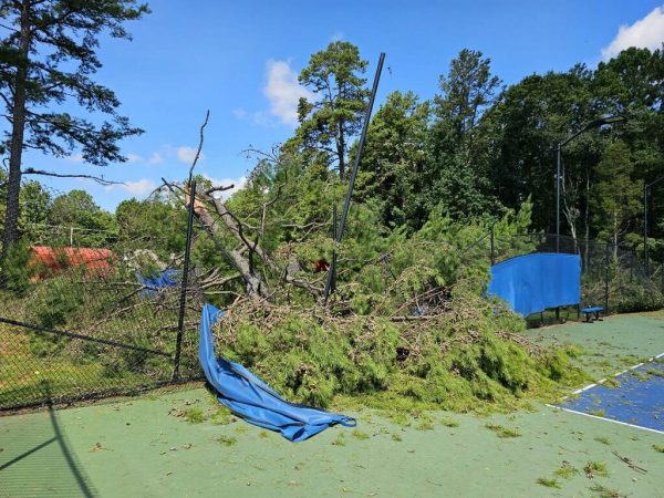 Spartan Park’s tennis courts sustained the most damage after a tornado tore through the area.
