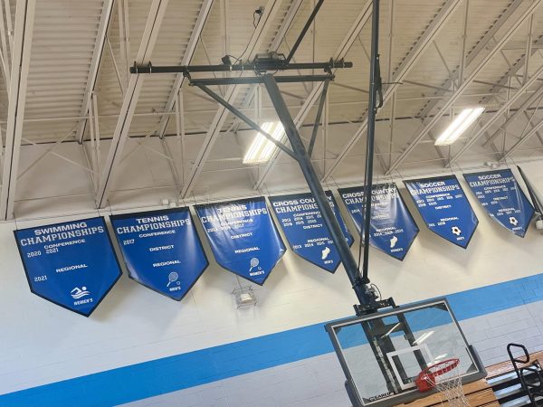 Before Title IX was passed in 1972, the banners that hung in high school gyms  across America looked very different. At the Community School of Davidson high school in North Carolina, men’s and women’s banners now alternate.