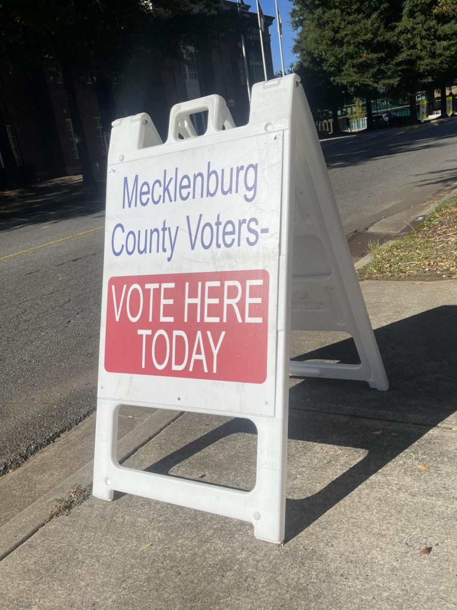 A sign indicating a polling station for early voting greets voters outside the Cornelius, N.C.  town hall. In-person early voting began on October 7 and continues until November 2. Election Day is November 5.
