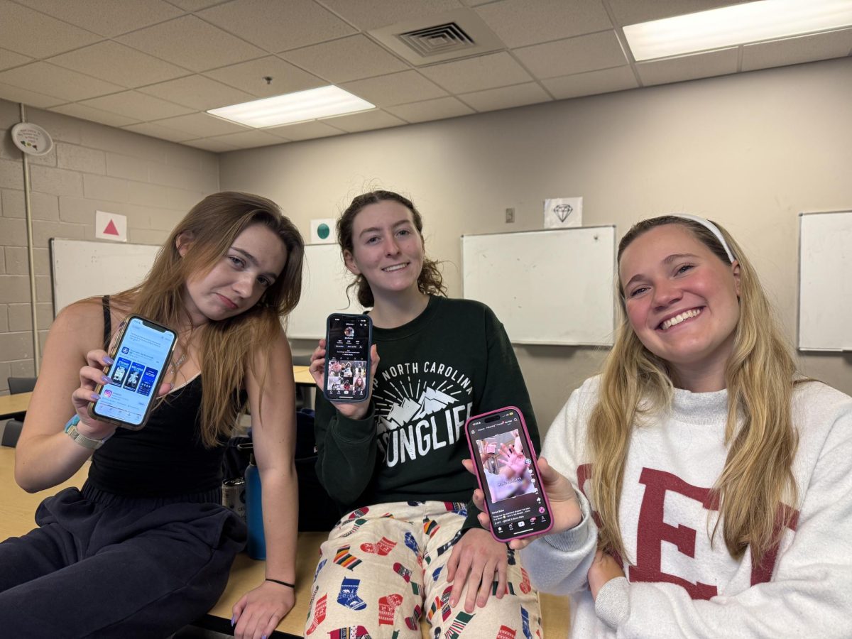 CSD seniors (from left) Jenni Lewman, Julia Vecchiarello and Madeline McKinley display their phones, two of whom have TikTok downloaded and one who has the app deleted and can no longer download it. The past month has been a turbulent one for TikTok users. The app briefly shut down but is now back, at least for the short term.
