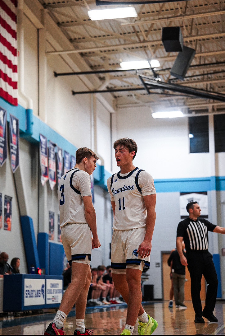 Austin Moran (25’) and Dermot Lowry (25’), who both achieved 1000 points at CSD, celebrate a play next to each other during a home game. The 1000 point pair took time to answer questions for the Spartan Questionnaire. (Photo used courtesy of Ben “Mack” Sidden @ _madebymack.)
