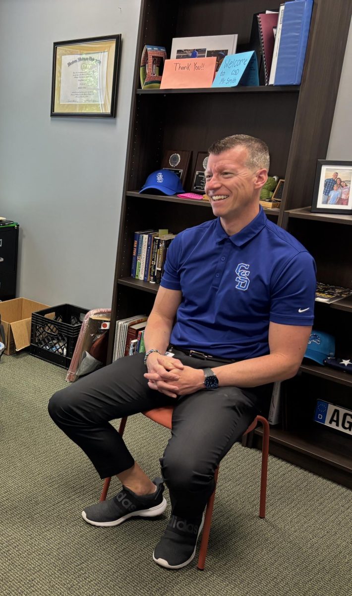 Craig Smith, Executive Director, is all smiles as he participates in the Spartan Questionnaire interview. After nearly a decade as Principal of a nearby charter school, Smith joined CSD with the hope. of building the community and encouraging students to “be your best.”