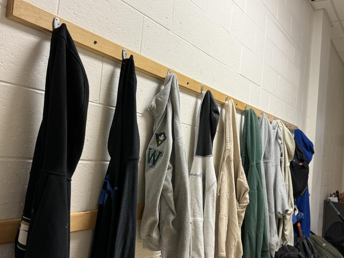 Sweatshirts and hoodies hang outside CSD’s Griffin gym. Changing seasons mean changes in clothing, too. Being comfortable adds to  learning.