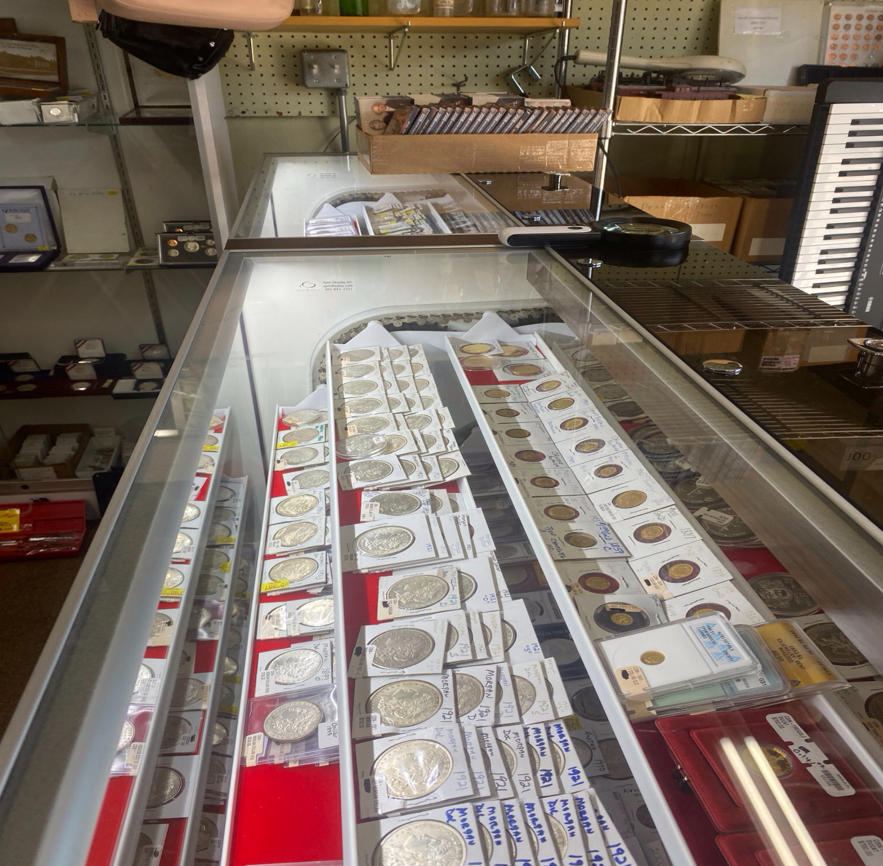 A glass case filled with antique coins of different materials, shapes, sizes, and values is just one of the many interesting displays in a pawn shop. The coins, which are from different eras and countries all over the world, caught the attention of student journalist and story writer, Liam Hogan.
