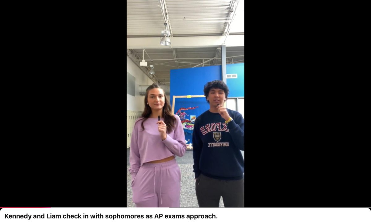 Kennedy Donley, left, and Liam Hogan, right, are on the hunt for sophomores who will be taking AP exams. (CSD Journalism class photo)