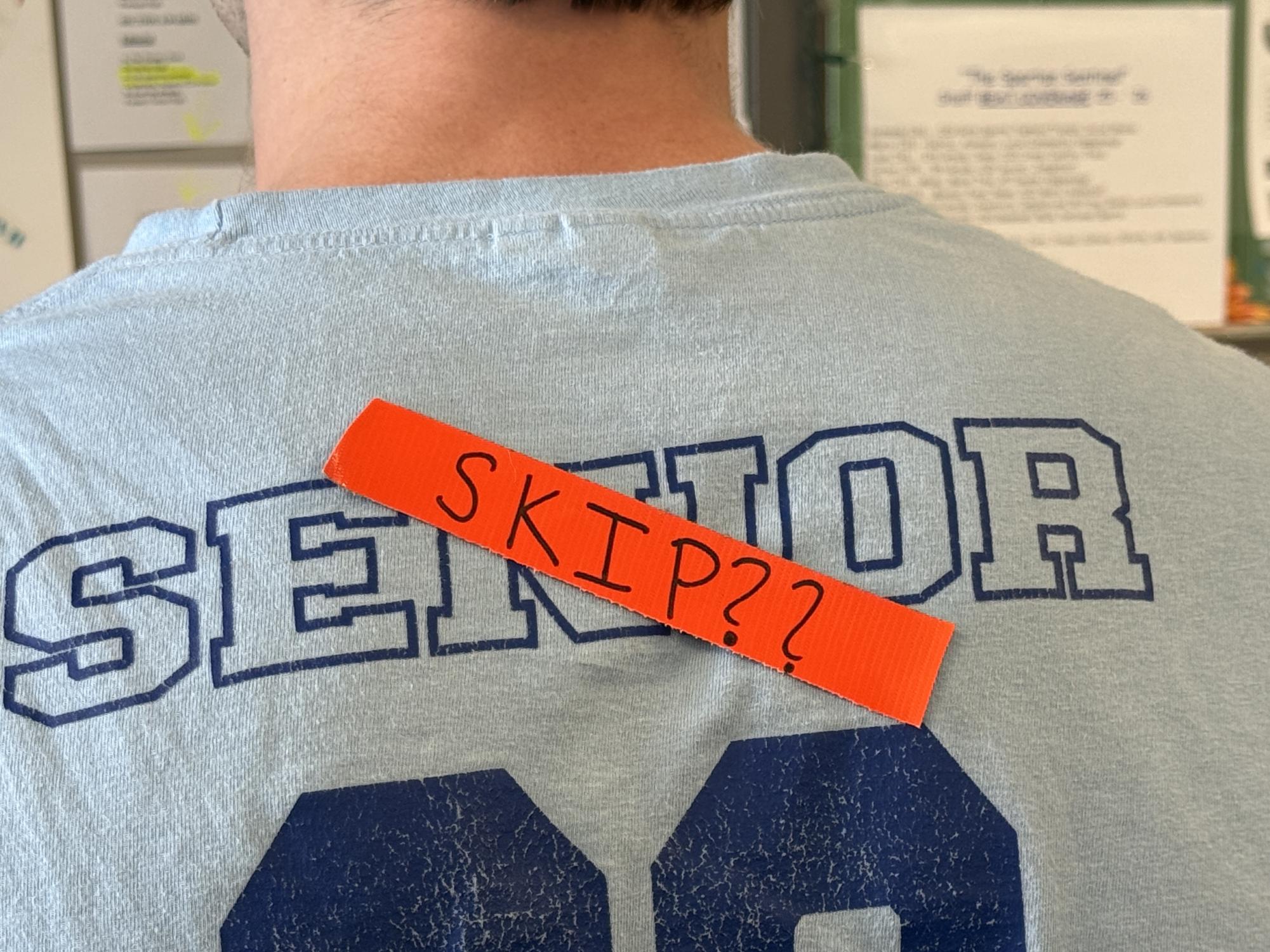 Senior, Maxwell Shealy (‘26), in his first day of school Class of ‘26 t-shirt, wears an orange “skip” label. Although not sanctioned by the school, many members of the senior class added a skip day to their school calendar the week after spring break. Opinions vary on whether it should be official or unofficial.
